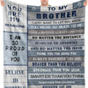 A gray fleece throw blanket with blue text that reads You are my sunshine to my brother.