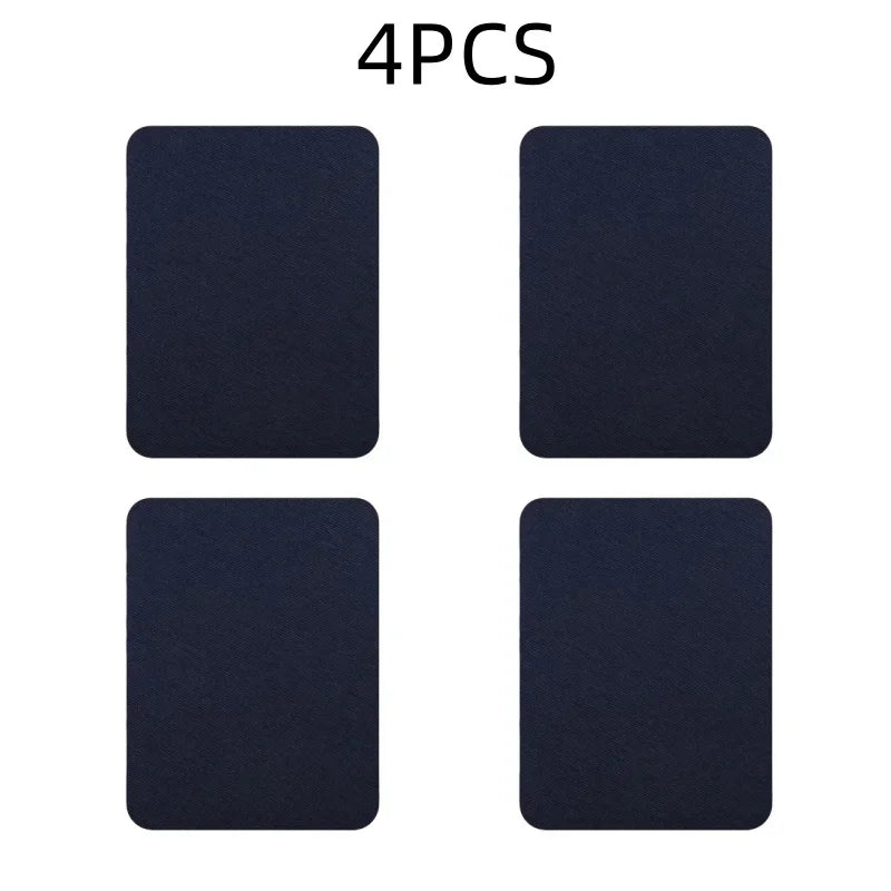 Four dark blue iron-on fabric patches for clothing repair and DIY decor