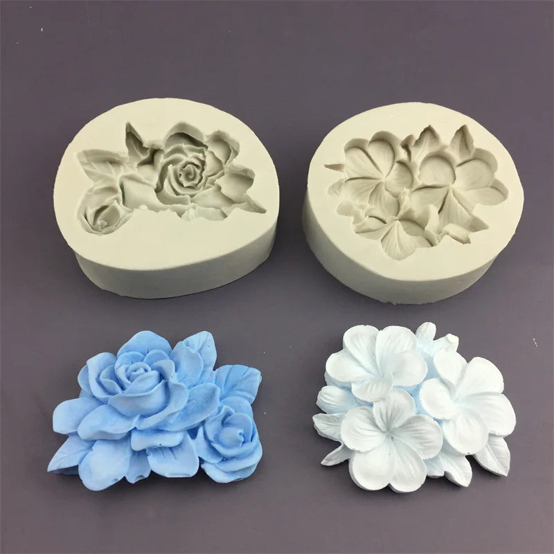 Two silicone molds of roses in light gray and white, showing flower shapes for baking and crafting.