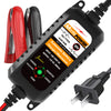 A black 12V automatic battery charger and maintainer unit with a power cord and clamp.