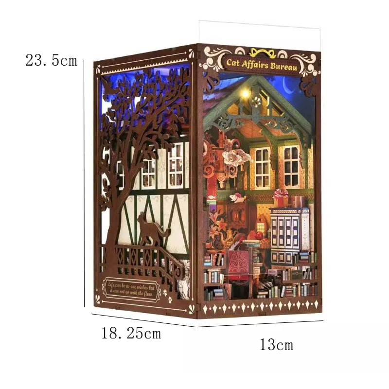A wooden puzzle bookshelf insert decor featuring a detailed cat affairs bureau scene with a tree and house.