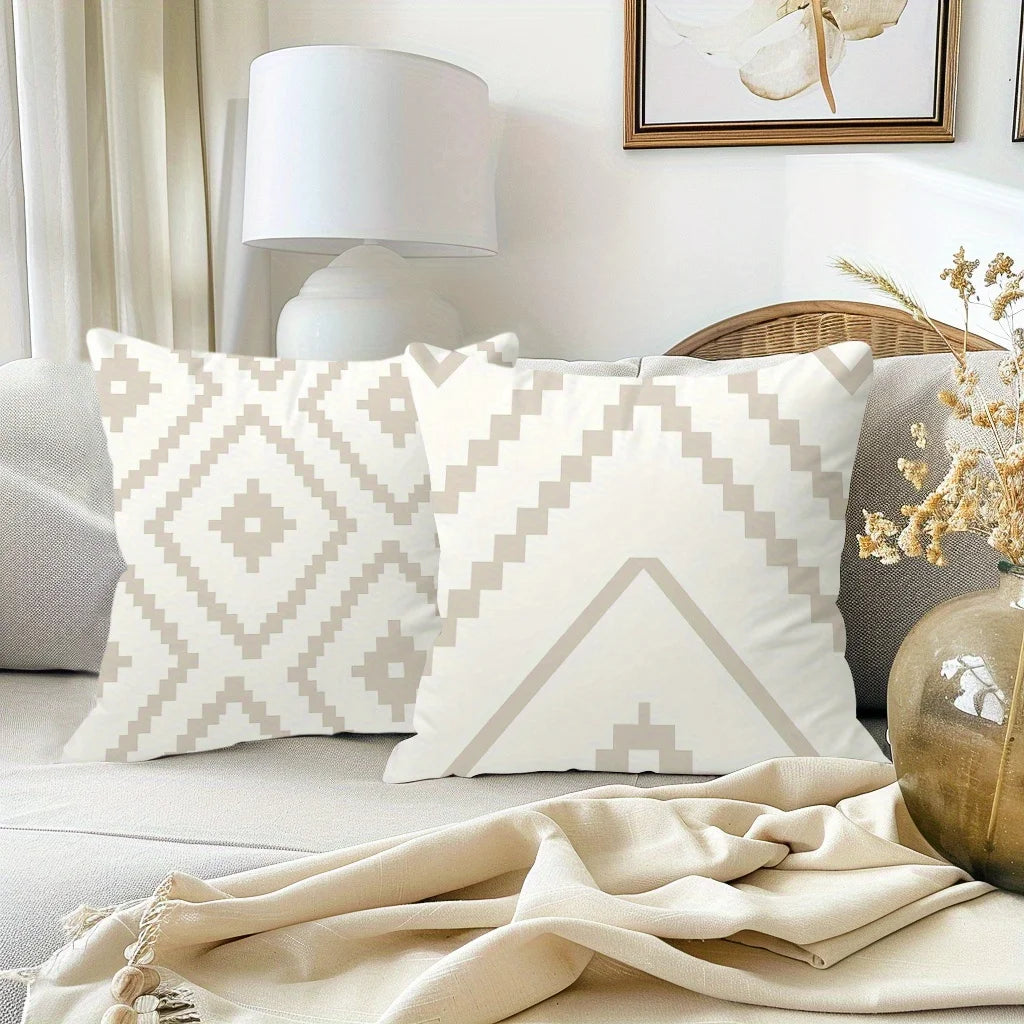 A decorative pillowcase with a geometric diamond pattern in beige and white on a light background.