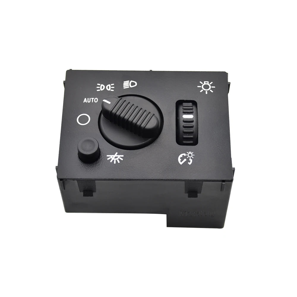 A black electronic switch with various indicator lights and a rotary control for headlights and fog lights.