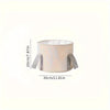 A light beige foldable insulated foot soak tub with a removable lid and handles.