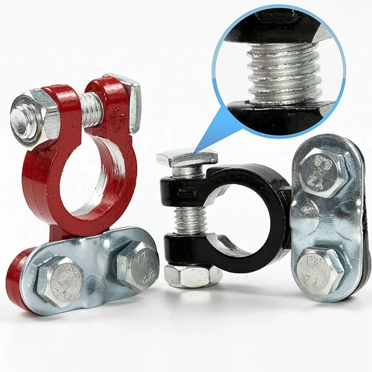 A pair of quick-release car battery terminal connectors shown with various metal and plastic components.