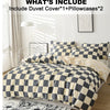 A checkered print bedding set featuring a duvet cover and two pillowcases in beige and gray tones.