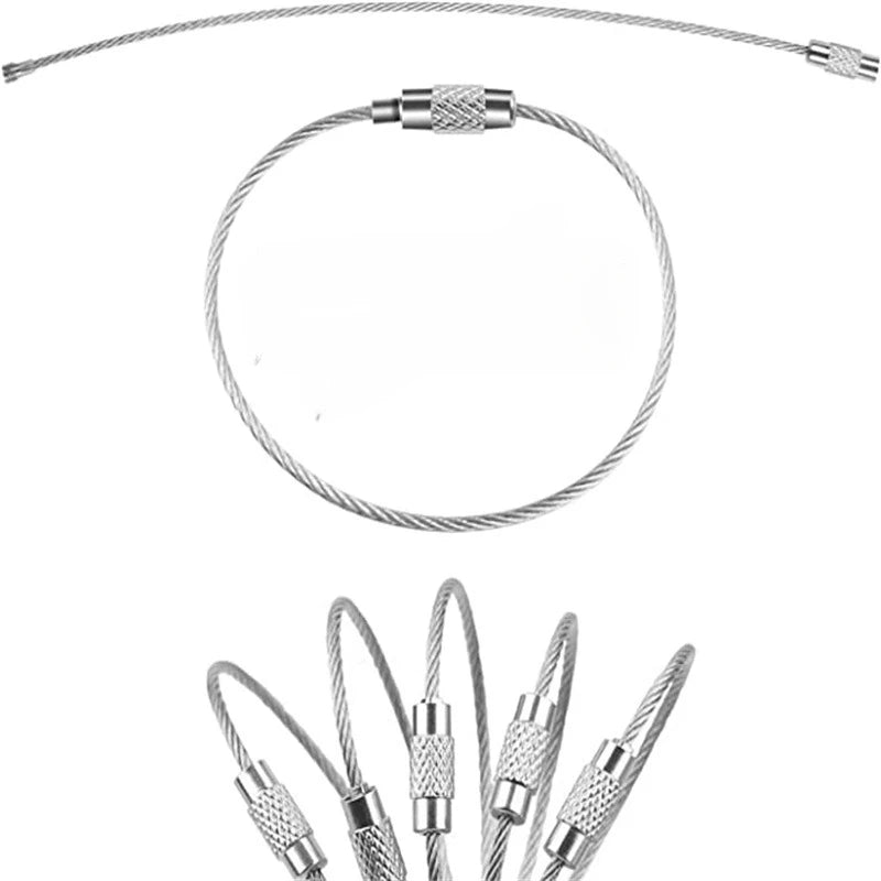 Stainless steel wire keychain cable with screw lock coiled into a circle and loose ends.