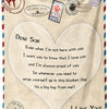 A beige fleece throw blanket with a heart design and text saying Dear Son I love you and I'm always proud of you