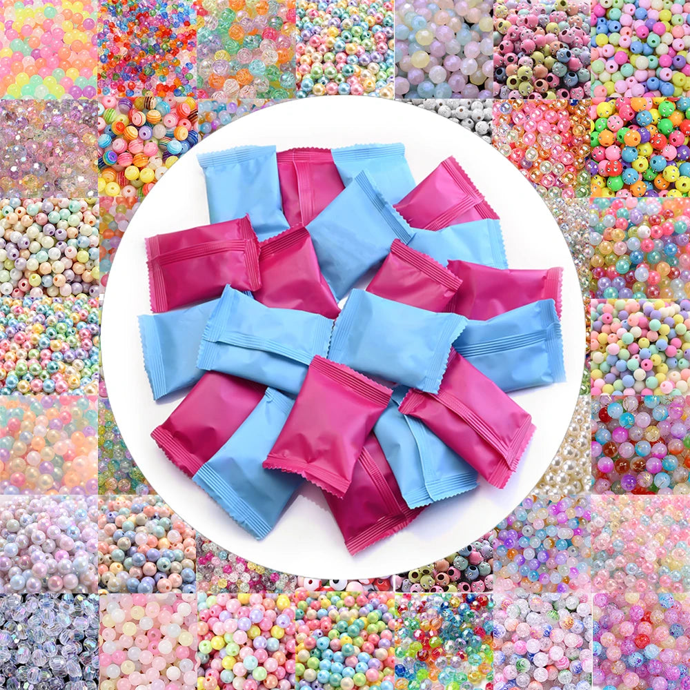A circular display of various shades of pink and blue acrylic beads used for jewelry making.