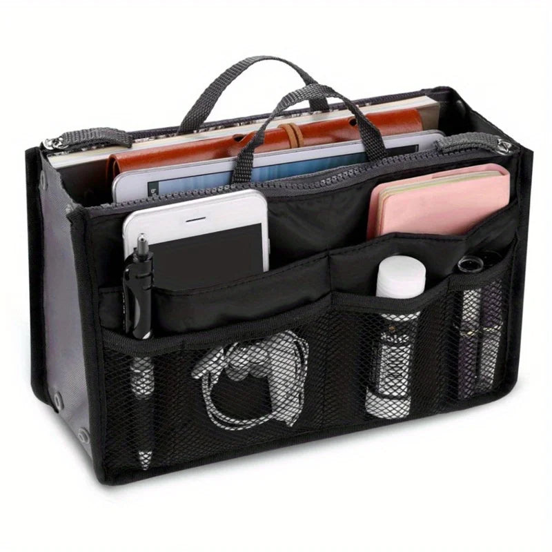 Black foldable oxford cloth makeup organizer bag holding various cosmetic and stationery items