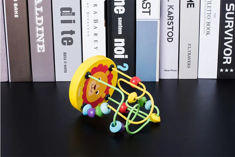 Yellow wooden bead maze roller coaster with colorful beads and an abacus counter