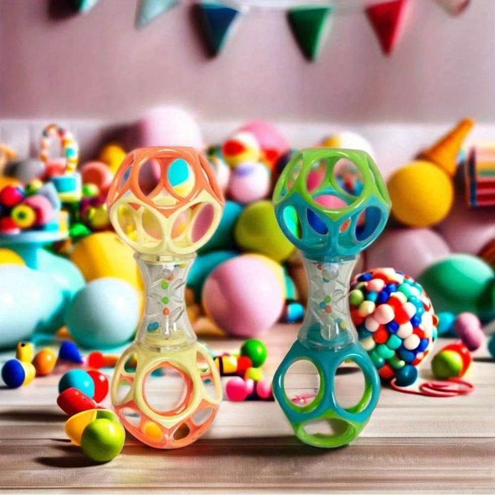 A collection of colorful easy-grasp baby rattle toys with soft teether beads displayed on a wooden surface.