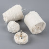 A set of white cotton polishing buffing wheels with metal shafts for use with a drill.