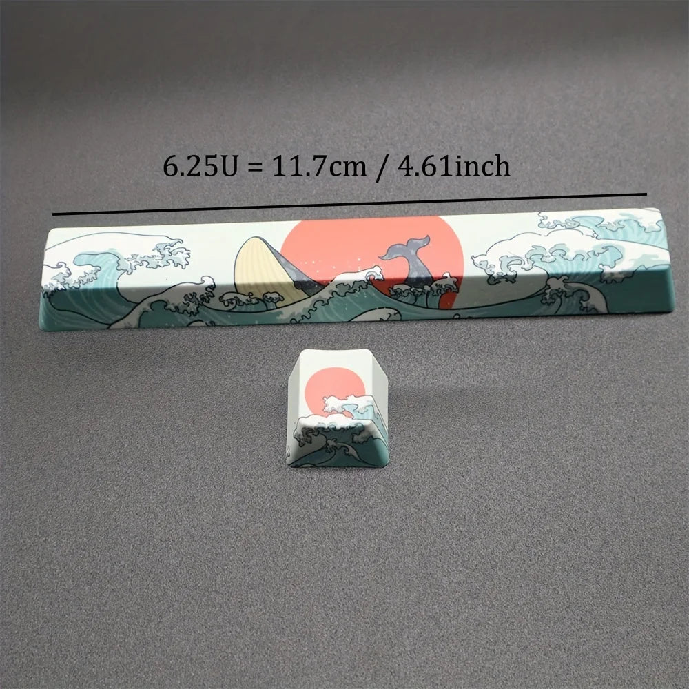 A long, rectangular PBT keycap featuring a coral sea design with waves and a rising sun motif.