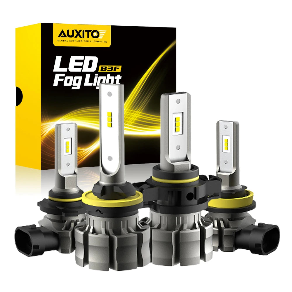 A box and several LED fog light bulbs with yellow illumination are displayed for automotive use.