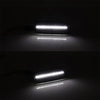 Close-up of an LED front side marker light illuminating a surface.