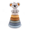 A stack of soft silicone building blocks shaped like an elephant and various colored rings for baby teething and early learni