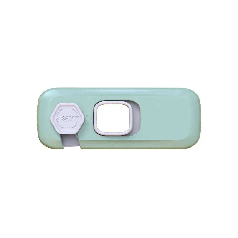 A light green child safety cabinet lock with a square opening and a 360-degree rotation indicator.