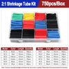 A box of heat shrink tubing kit containing various colors and lengths of black, red, yellow, blue, and green tubing.