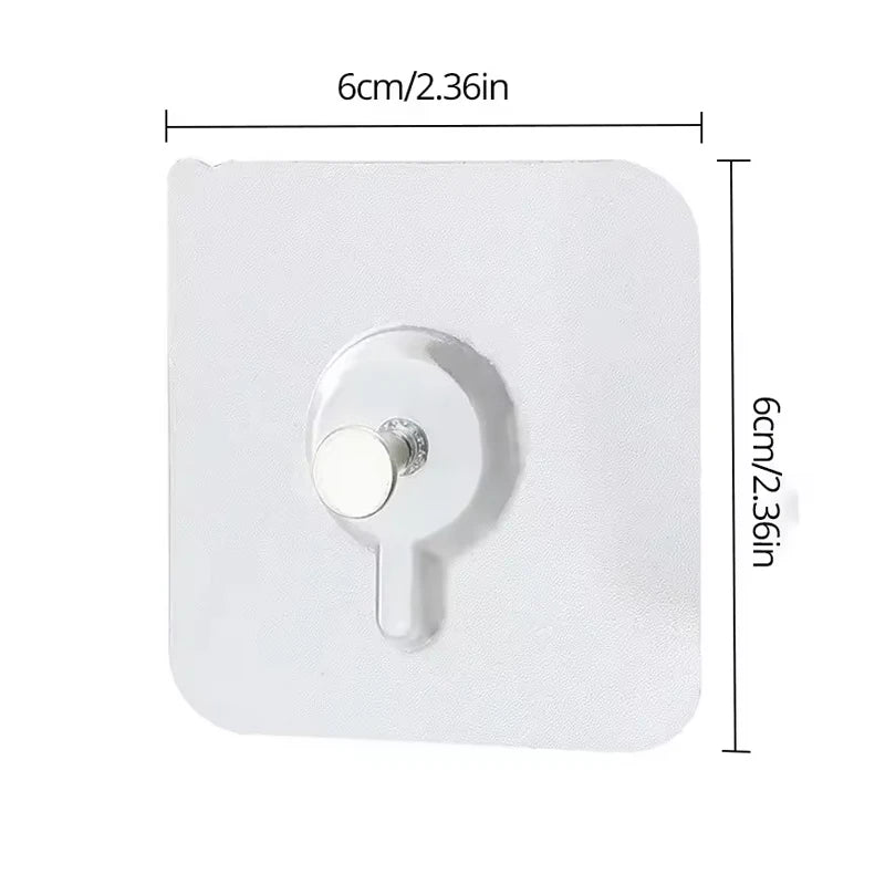 A white adhesive hook with a round pull tab is shown against a white background.