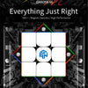A close-up of a GAN 356 M magnetic speed cube puzzle with white and blue components against a dark background.