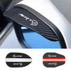 Black carbon fiber car side mirror rain guards with an SRT logo and red accents