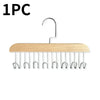 A wooden hanging clothes rack with multiple metal hooks for hanging clothes.