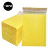 A stack of 100 yellow bubble mailers, padded self-seal shipping envelopes.