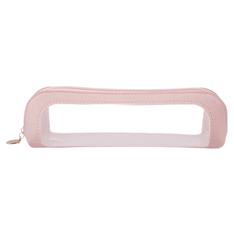 A pink clear waterproof travel makeup organizer pouch with a leather trim.