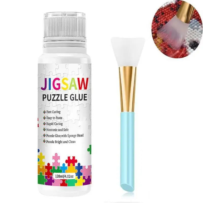 A bottle of jigsaw puzzle glue with a white brush applicator and a sponge tip shown next to a close-up view.