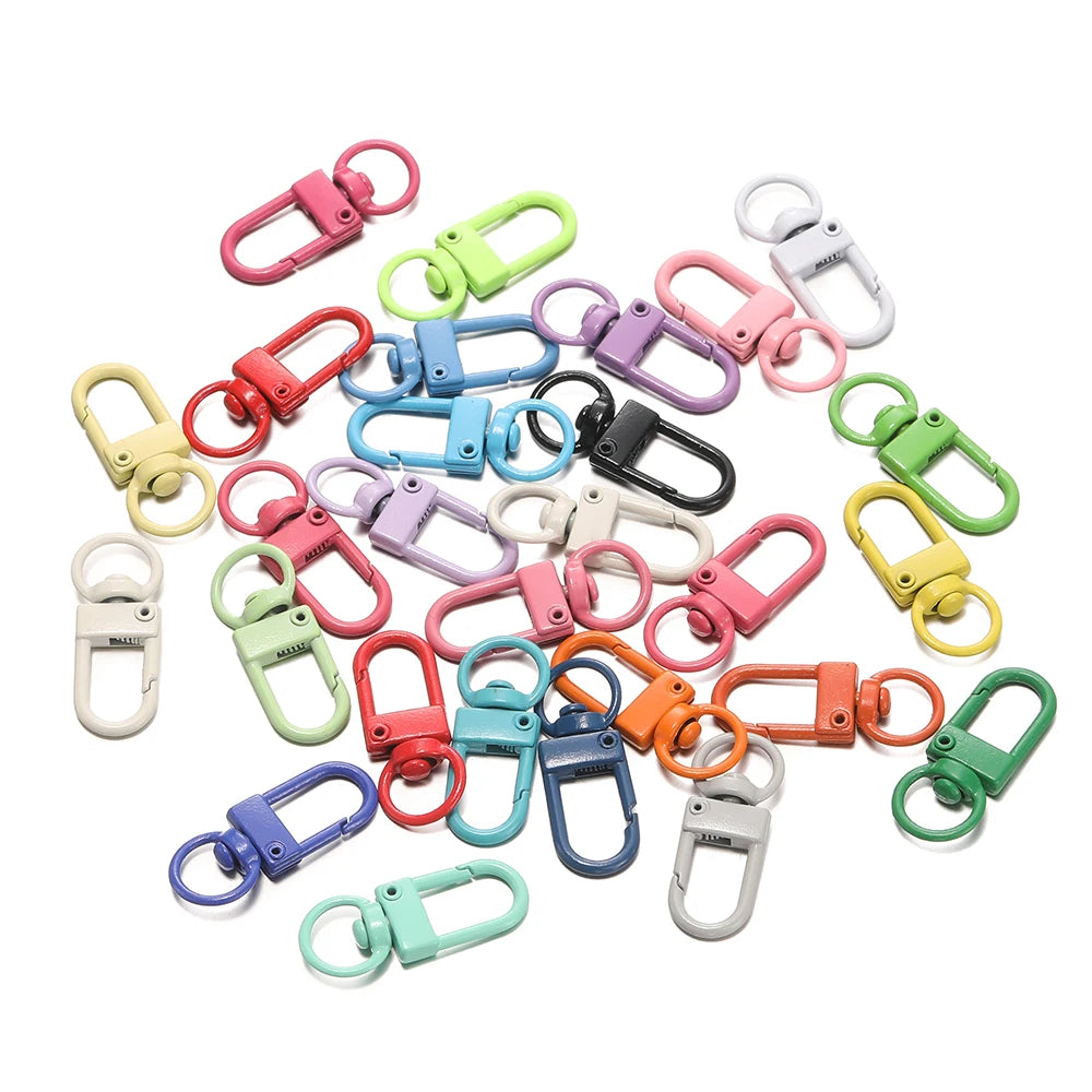A collection of colorful alloy lobster clasp hooks for DIY jewelry making, featuring various colors like pink, green, yellow,