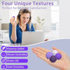 A woman is using a laptop while holding purple and white silicone sensory balls for stress relief and focus aid.