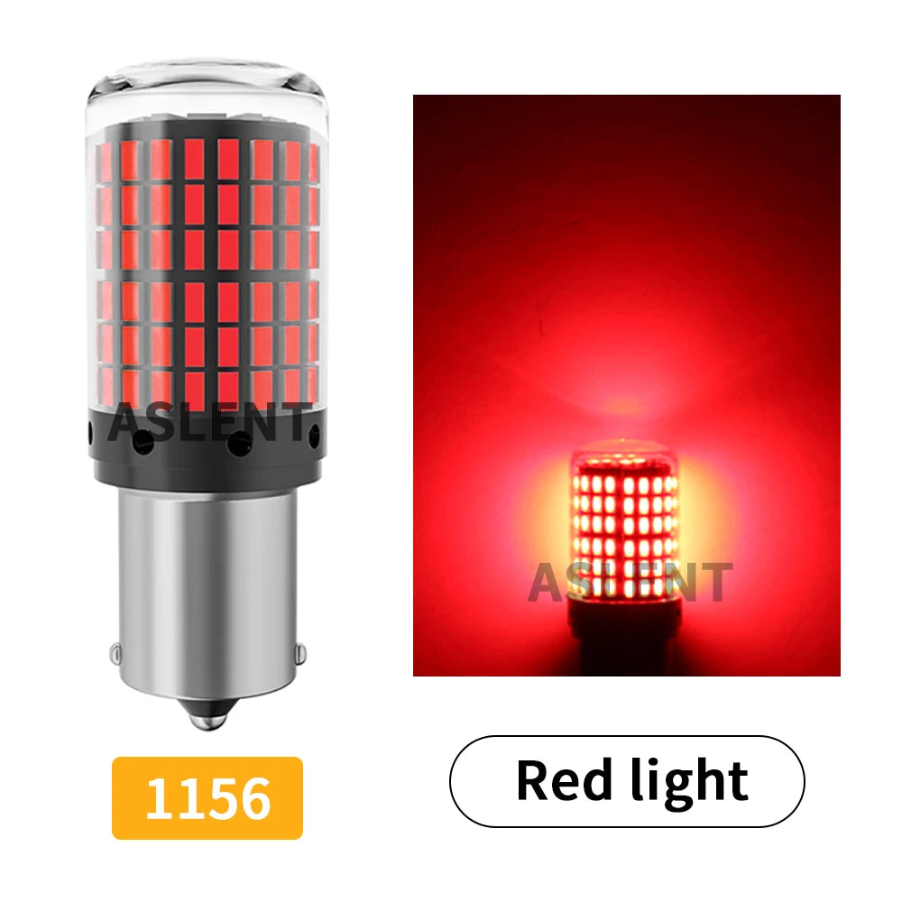 A close-up view of a red LED light bulb with a grid pattern, used for turn signals or brake lights.