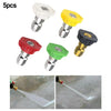 A set of five high pressure washer nozzles in white, yellow, and black, shown spraying water onto a wooden surface.