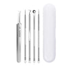 A set of five stainless steel acne and blackhead removal tools with a white protective case.