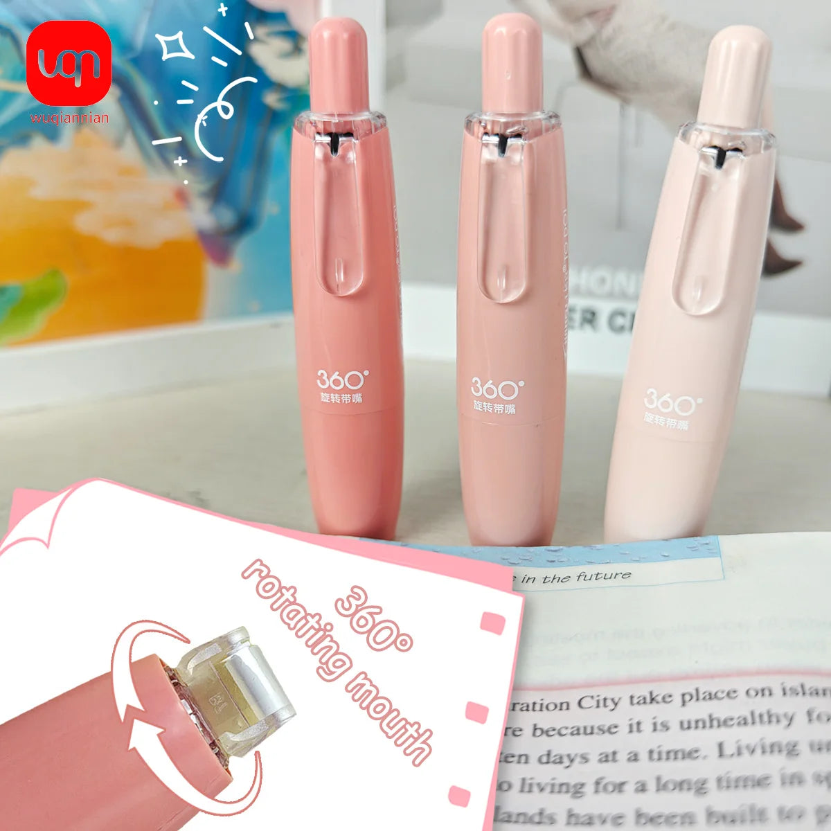 A set of four pink retractable double-sided adhesive tape roller pens is displayed on a white surface.