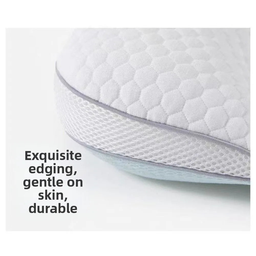 Close-up of a white quilted baby pillow showing exquisite edging and soft texture.