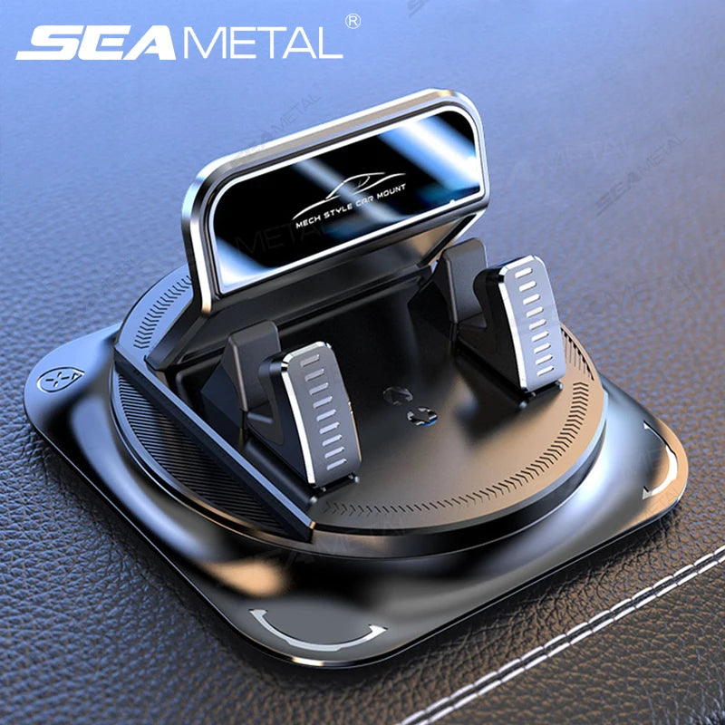 A black 360° rotating car dashboard phone mount with a silver mount and anti-slip silicone base.
