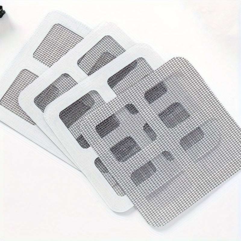 A stack of white mesh filters used as disposable shower drain hair catchers for sinks and floor drains.