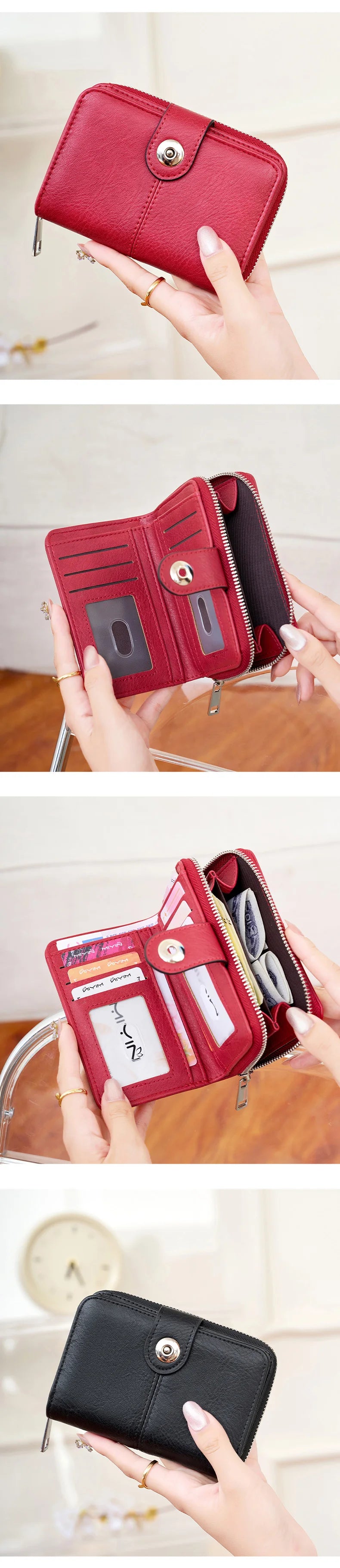 A close-up of a red leather wallet with a zipper closure being held by a hand.