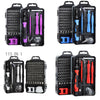A collection of precision screwdriver bits and tools in various colors including black, purple, pink, blue, and red housed in