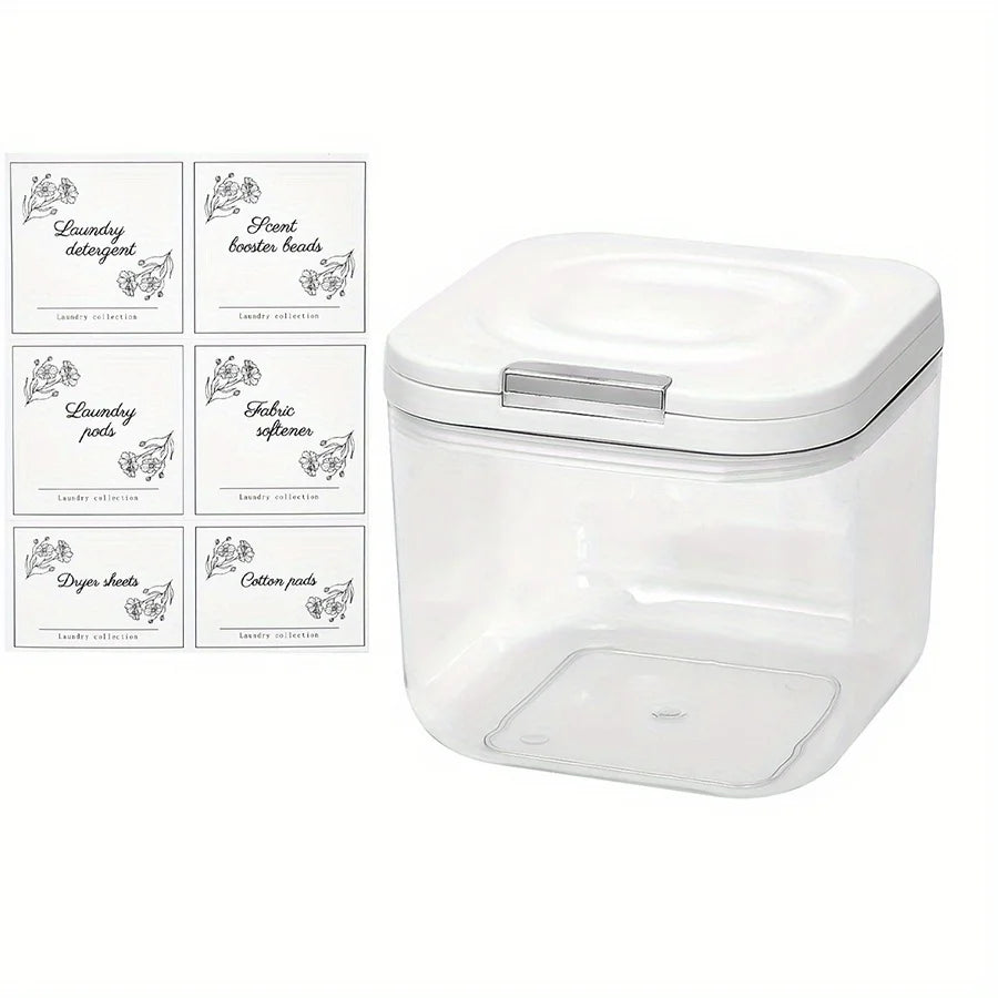A clear plastic container with an airtight lid holds various laundry pods and sheets.