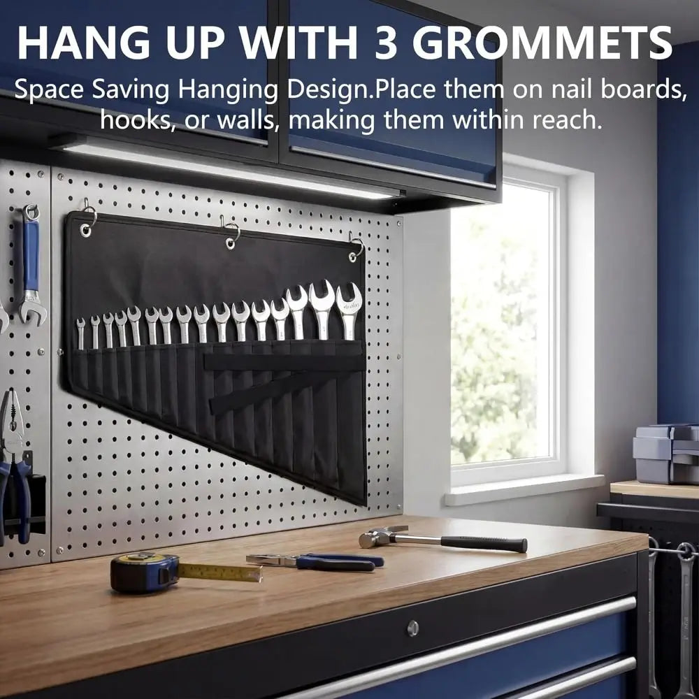 A black hanging organizer with three grommets is displayed on a wooden countertop.