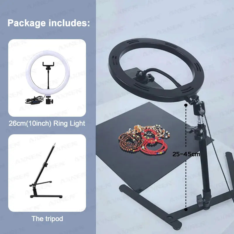 Black foldable overhead tripod with a ring light mounted for smartphone photography