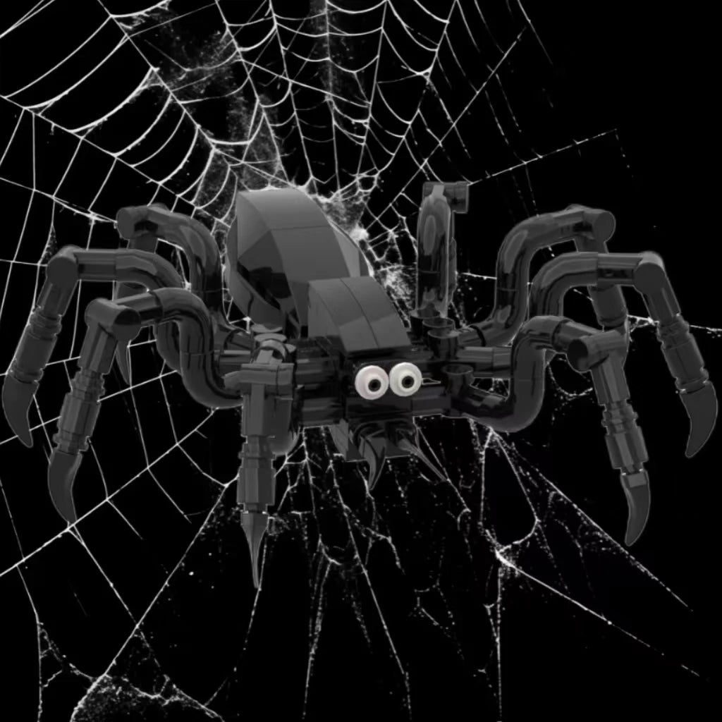 A black spider model is positioned in the center of a white spiderweb against a black background.