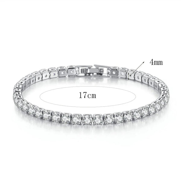 A close-up view of a diamond tennis bracelet and bangle set with a clasp and measurement markings.