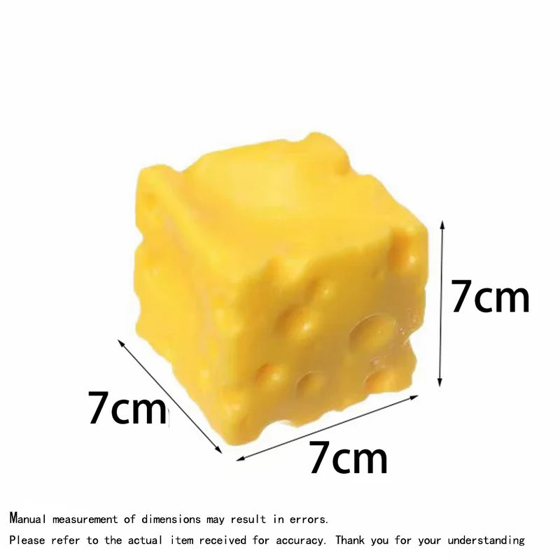 A yellow squishy butter block fidget toy shown with dimensions of 7cm by 7cm.