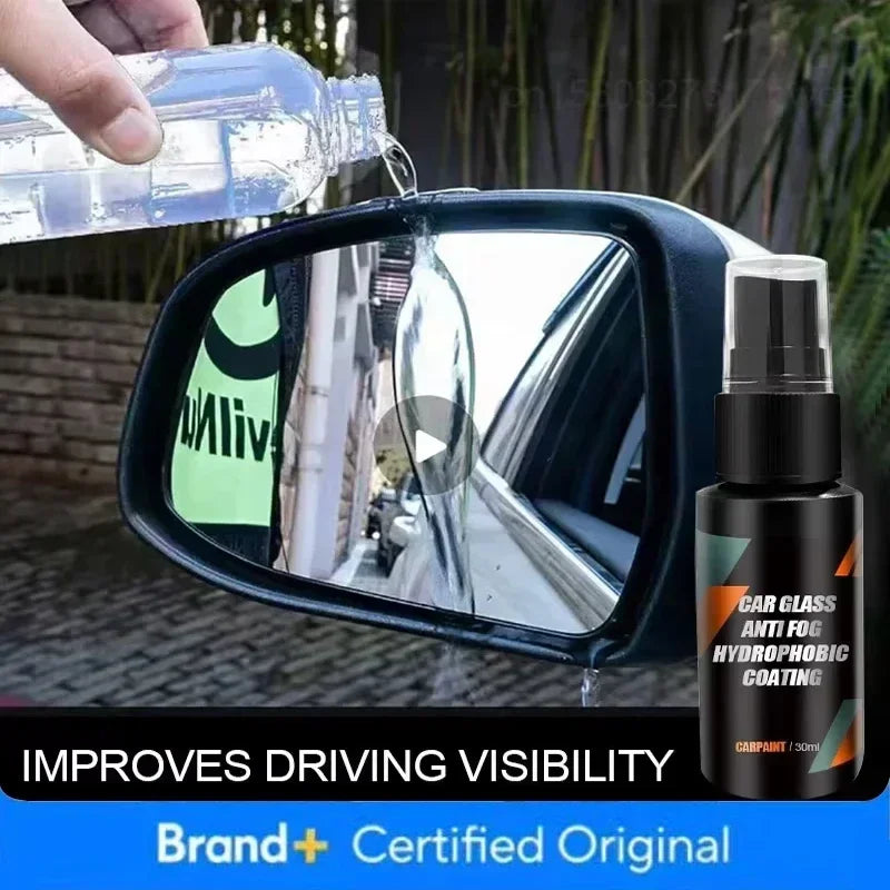 A bottle of car glass anti fog hydrophobic coating is being sprayed onto a car's side mirror.