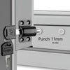 Close-up of a sliding door lock mechanism with a punch and two keys installed on a silver frame.