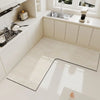 L-shaped crystal velvet kitchen mat with non-slip backing placed on a white kitchen floor.